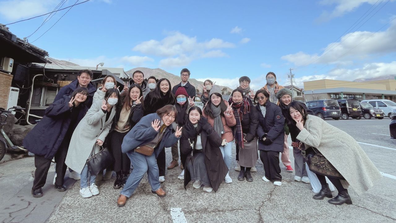 Group photo of members from Taiwan, Japan, Malaysia, and Hong Kong at the overseas intensive camp.